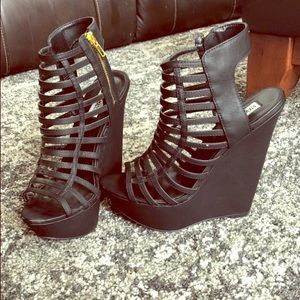 Black zip up open toed wedge heels